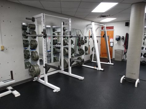 Image of weights and bars in the Century College weight room.