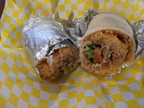 Ground beef burrito with beans, cheese, and rice.