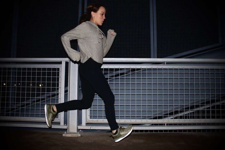 Century College student trains for their next marathon on the campus bridge.