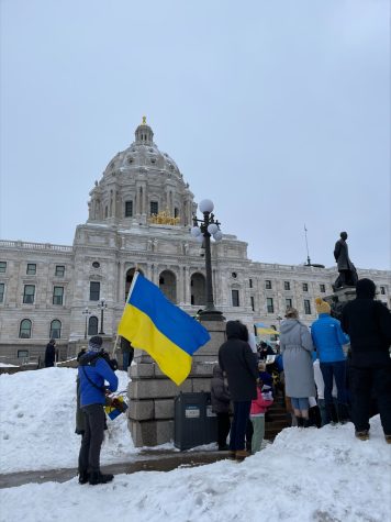 The St. Paul Capital building towers over the crowds as they protest the war in Ukraine.