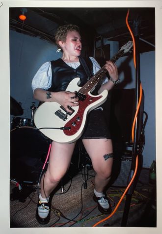 Photo of a guitarist by Teagen Greene