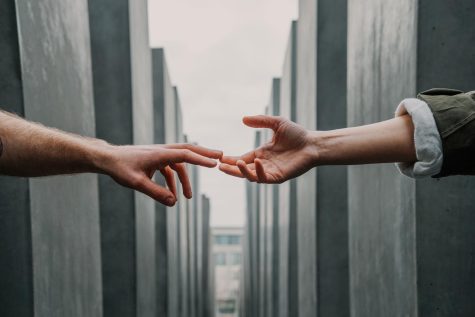 two hands touching, a connect