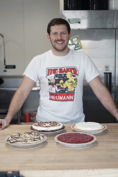 Ben the Baker stands proudly with four different pies